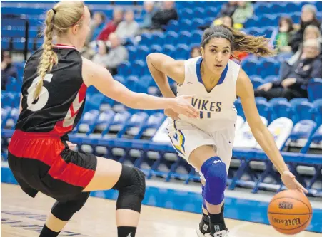  ??  ?? Vikes forward Marissa Dheensaw and Lena Wenke of the Wesmen will meet again today in Winnipeg.