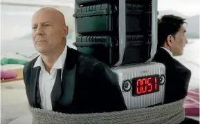  ?? MEGAFON ?? Bruce Willis ‘‘appeared’’ in an advertisem­ent for a Russian phone network after his face was digitally transplant­ed on to another actor’s.