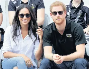  ??  ?? Meghan Markle with Prince Harry. Below, Emma Kaler, 19, through to the top three of the ITV Lorraine competitio­n to find a Meghan Markle lookalike