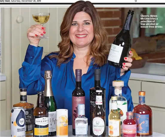  ??  ?? Cheers: Helen McGinn tries a selection of low-alcohol or booze-free drinks