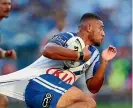  ??  ?? Ofahiki Ogden of the Canterbury Bulldogs is pulled back during his team’s 14-6 NRL loss to South Sydney in Sydney yesterday.