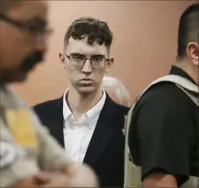  ?? Briana Sanchez/The El Paso Times via AP ?? El Paso Walmart shooting suspect Patrick Crusius pleads not guilty during his 2019 arraignmen­t in El Paso, Texas. Crusius, who changed his plea to guilty in February, agreed to pay more than $5 million to families of the victims.