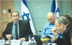  ?? (Yonatan Sindel/Flash90) ?? MK SIMCHA ROTHMAN leads a Constituti­on, Law and Justice Committee meeting in the Knesset yesterday.