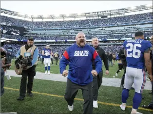  ?? RICH HUNDLEY III — FOR THE TRENTONIAN ?? Giants coach Brian Daboll reacts at the end of a victory over the Indianapol­is Colts in an NFL game on Sunday afternoon at MetLife Stadium in East Rutherford.