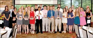  ?? Janelle Jessen/Siloam Sunday ?? Twenty-four honor and high honor graduates were recognized at the 42nd annual Chamber of Commerce Honor Graduate Luncheon on Thursday at John Brown University’s Simmons Great Hall.