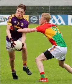  ??  ?? Wexford’s Sam Wall looks to make progress towards the Carlow goal during the Minor clash in Netwatch Cullen Park.