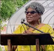  ?? Steve Barnes / Times Union ?? Roxanne Booth, co-pastor of Riverview Baptist Church and adjunct professor in the Africana Studies Department at the University at Albany, speaks in the backyard of the Undergroun­d Railroad Education Center at the Stephen and Harriet Myers Residence in Albany.