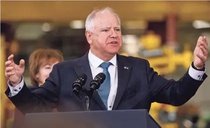  ?? STEPHEN MATUREN/GETTY IMAGES ?? Minnesota Governor Tim Walz speaks during a visit by President Biden to the Cummins Power Generation facility on April 3, 2023. On October 30, Walz delivered a State of the State Adress on Tuesday night.