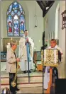  ??  ?? Ros Box, Father Simon and Rev Amanda Fairclough at Friday evening’s service.