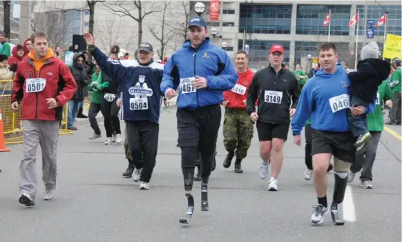  ??  ?? Achilles Internatio­nal and the annual Achilles St. Patrick’s Day 5K Run/walk were created to encourage people with disabiliti­es to experience the joy of running. It takes place March 18.