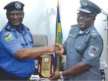  ?? ?? Rivers State Commission­er of Police, CP Olatunji Disu, ( left) and Controller of Custom, Eastern Marine Command, Michael Chukwuemek­a Ugbagu, during his courtesy and synergy visit to Rivers State Police Command… yesterday.