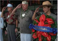  ??  ?? Lou Conter, center, at the 2008 Pearl Harbor memorial ceremony.