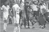  ?? BRAD HORRIGAN/THE ?? Windham native Alfonso Vazquez, facing, checks into the game for Hartford Athletic against Philadelph­ia Union II at Dillon Stadium Saturday night. After going down 2 goals, Hartford came back to win 3-2.