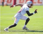  ?? ADOLPHE PIERRE-LOUIS/JOURNAL ?? UNM’s Jalin Burrell believes he is quicker than Liberty’s Antonio Gandy-Golden, but the size of the Flames’ receiver is a concern.