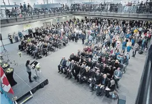  ?? MATHEW MCCARTHY WATERLOO REGION RECORD ?? Mourners attend a memorial at the University of Waterloo on Wednesday for students and alumni who were killed on flight PS752. All 176 people aboard the Ukrainian plane died.