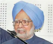 ?? - PTI ?? BRIEFING: Former prime minister Manmohan Singh addresses a press conference in Ahmedabad on Tuesday.