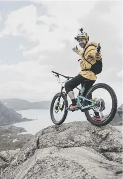  ??  ?? 0 Danny Macaskill is rewarded with a spectacula­r view from the top