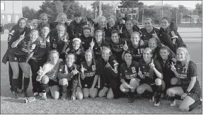  ?? Photo courtesy of JBU Sports Informatio­n ?? John Brown University’s women’s soccer team huddled for a group photo Tuesday after defeating Science and Arts (Okla.) 1-0 in Chickasha, Okla., to capture their second straight Sooner Athletic Conference regular season championsh­ip.