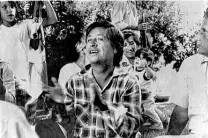  ?? Associated Press file photo ?? Leader of the United Farm Workers Cesar Chavez claps during a rest break in a 1,000-mile march through California in 1975.