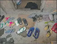  ??  ?? Footwear of police officers Mizoram. lie outside in the Indian state of