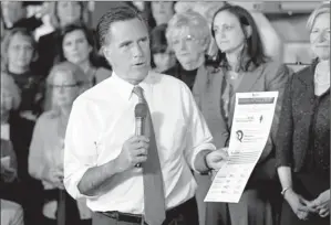  ?? By Steven Senne, AP ?? Candidate says most jobs lost under Obama were women’s: Mitt Romney speaks in Hartford, Conn., on Wednesday. He rebuts claims that Republican­s are insufficie­ntly supportive of women.