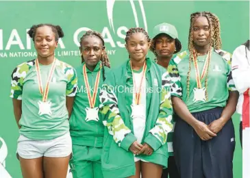  ?? ?? Members of the tennis team after winning bronze and silver in the women’s doubles event