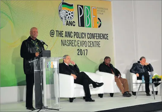  ?? PICTURE: ITUMELENG ENGLISH ?? BRIEFING: Minister in the Presidency Jeff Radebe speaks during the Progressiv­e Business Forum’s breakfast briefing at the ANC’s policy conference in Nasrec, Soweto. Seated are ANC Progressiv­e Business Convener Daryl Swanepoel, left, ANC...