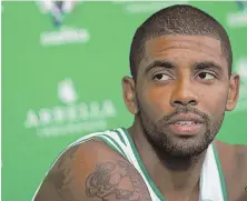  ?? STAFF PHOTO BY MATT STONE ?? NOT LOOKING BACK: Kyrie Irving said yesterday at Celtics media day he has not talked to LeBron James since being acquired in a trade with the Cavaliers.