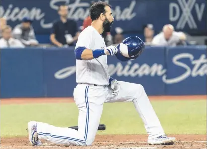  ?? CP PHOTO ?? Toronto Blue Jays’ Jose Bautista strikes out against the Kansas City Royals in the eighth inning of their American League game in Toronto on Tuesday.
