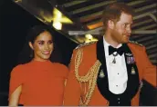  ?? SIMON DAVSON/ POOL UIA AP ?? BritYin’s Prince HYrry Ynd MeghYn, Duchess of Sussex Yrri2e Yt the RoyYl Albert HYll in London on MYrch 7.