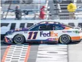  ?? MIKE CAUDILL/AP ?? Denny Hamlin drives during the NASCAR Cup Series race on Sunday at Richmond Raceway in Richmond, Virginia.