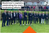  ?? ?? Blackmoor’s captains celebratin­g the club’s fundraisin­g efforts