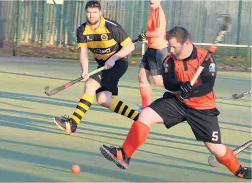  ??  ?? Sean Carney lines up a shot against South Manchester