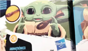  ?? — Reuters ?? Fair game: The Hasbro logo is seen on the Star Wars Galactic Snackin Grogu toy in a shop in Manhattan, New York City. The toy maker needs to improve capital allocation and shareholde­r returns, according to Butterly.