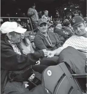  ?? Helen H. Richardson, Denver Post file ?? Rockies fans and Cubs fans show they can get along at Coors Field.