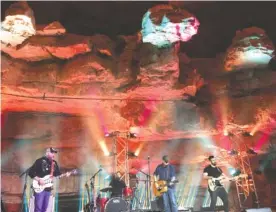  ??  ?? Singer-songwriter Chris Knight, center, and his band perform last month, 333 feet below ground in Cumberland Caverns near McMinnvill­e, Tenn.