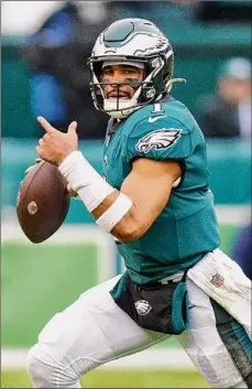  ?? Chris Szagola / Associated Press ?? Philadelph­ia Eagles quarterbac­k Jalen Hurts is a finalist for AP NFL MVP, Offensive Player of the Year and tied a franchise record with 33 total touchdowns.
