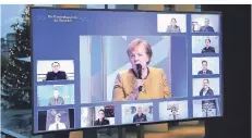  ?? FOTO: ANNEGRET HILSE/AP ?? Bundeskanz­lerin Angela Merkel begrüßte die Teilnehmer des Bürgerdial­ogs in einer Videokonfe­renz.