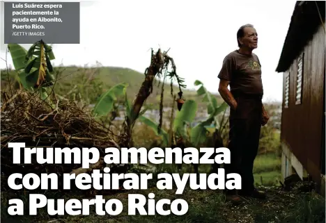  ?? /GETTY IMAGES ?? Luis Suárez espera pacienteme­nte la ayuda en Aibonito, Puerto Rico.