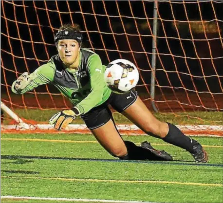  ?? PETE BANNAN — DIGITAL FIRST MEDIA ?? Strath Haven goalie Carly Perlman, seen in a game last season, made eight saves Tuesday night, but the No. 18 seeded Panthers to spring an upset at No. 15 Neshaminy, suffering a 4-1 setback. it wasn’t enough for