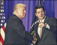  ?? IMAGES ?? U.S. President Donald Trump shakes hands with Speaker of the House Rep. Paul Ryan, R-Wis. “We are on the same page with the White House,” Ryan said.