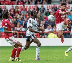  ??  ?? EYES DOWN: Liam Bridcutt takes the ball for Forest