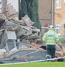  ?? Picture: PA. ?? A gas engineer in Launcelot Close, Andover, where police say the body of a man has been found.