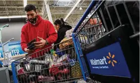  ?? Eduardo Munoz Alvarez/Associated Press ?? The inflation surge led New York City resident Francisco Santana to shift his grocery shopping from local chains to Walmart.