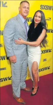  ?? PHOTO: JACK PLUNKETT/INVISION/AP ?? John Cena and Nikki Bella are WWE stars