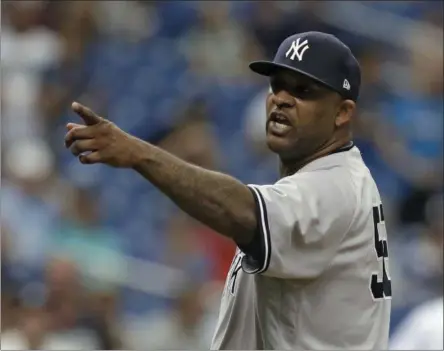  ?? CHRIS O’MEARA — THE ASSOCIATED PRESS ?? New York Yankees’ CC Sabathia points at the Tampa Bay Rays dugout after he was ejected for hitting Tampa Bay Rays’ Jesus Sucre with a pitch during the sixth inning of a baseball game Thursday, Sept. 27, 2018, in St. Petersburg, Fla.