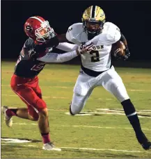  ?? TIM GODBEE / For the Calhoun Times ?? Calhoun’s Malik Lawrence (right) breaks away from a Sonoravill­e defender during a game earlier this season.