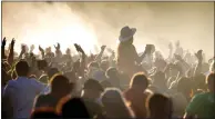  ??  ?? Lauren Mayberry of Chvrches, main picture, held the crowds spellbound