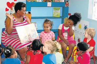  ?? /Fredlin Adriaan ?? Mobilising: Children who attend the Smiley Kids preprimary school in Walmer, Port Elizabeth, celebrate World Read Aloud Day in this file photograph. The annual event is aimed at drawing attention to the importance of reading aloud and sharing stories.