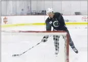  ?? MATT SLOCUM — THE ASSOCIATED PRESS ?? Philadelph­ia Flyers’ Justin Braun works out during training camp at the hockey team’s practice facility, Monday in Voorhees, N.J.